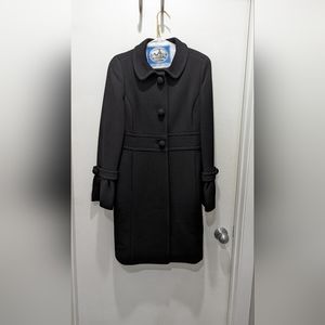 Black coat. Bell sleeve